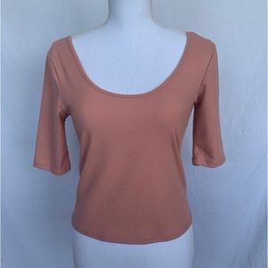 Short sleeved fine ribbed top. Size M.